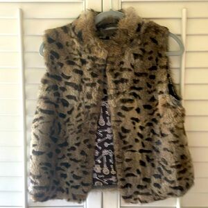 - What Goes Around Comes Around Rabbit Fur Printed Vest.